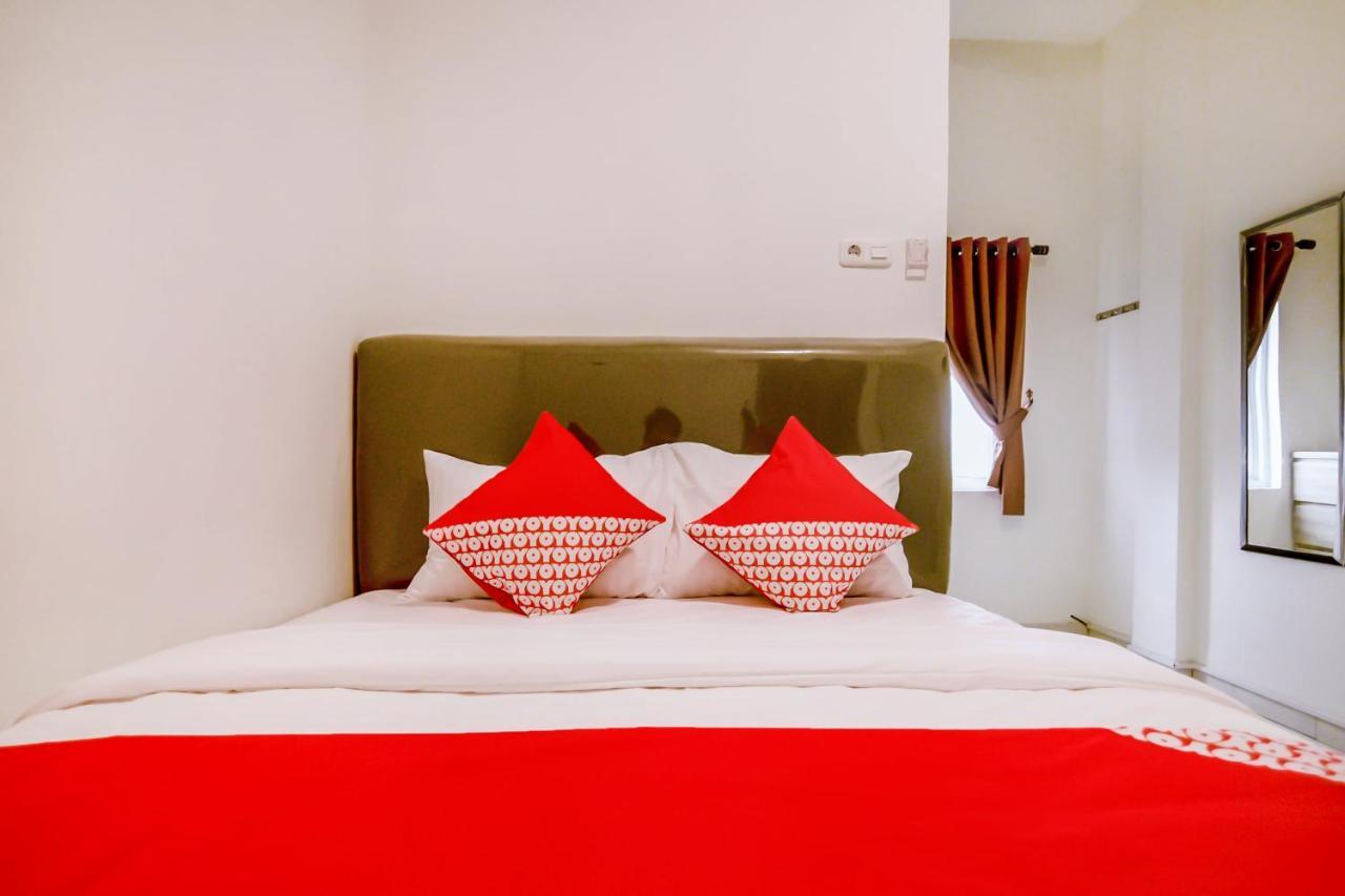 Oyo 183 The Pipe House Hotel Palembang Bagian luar foto