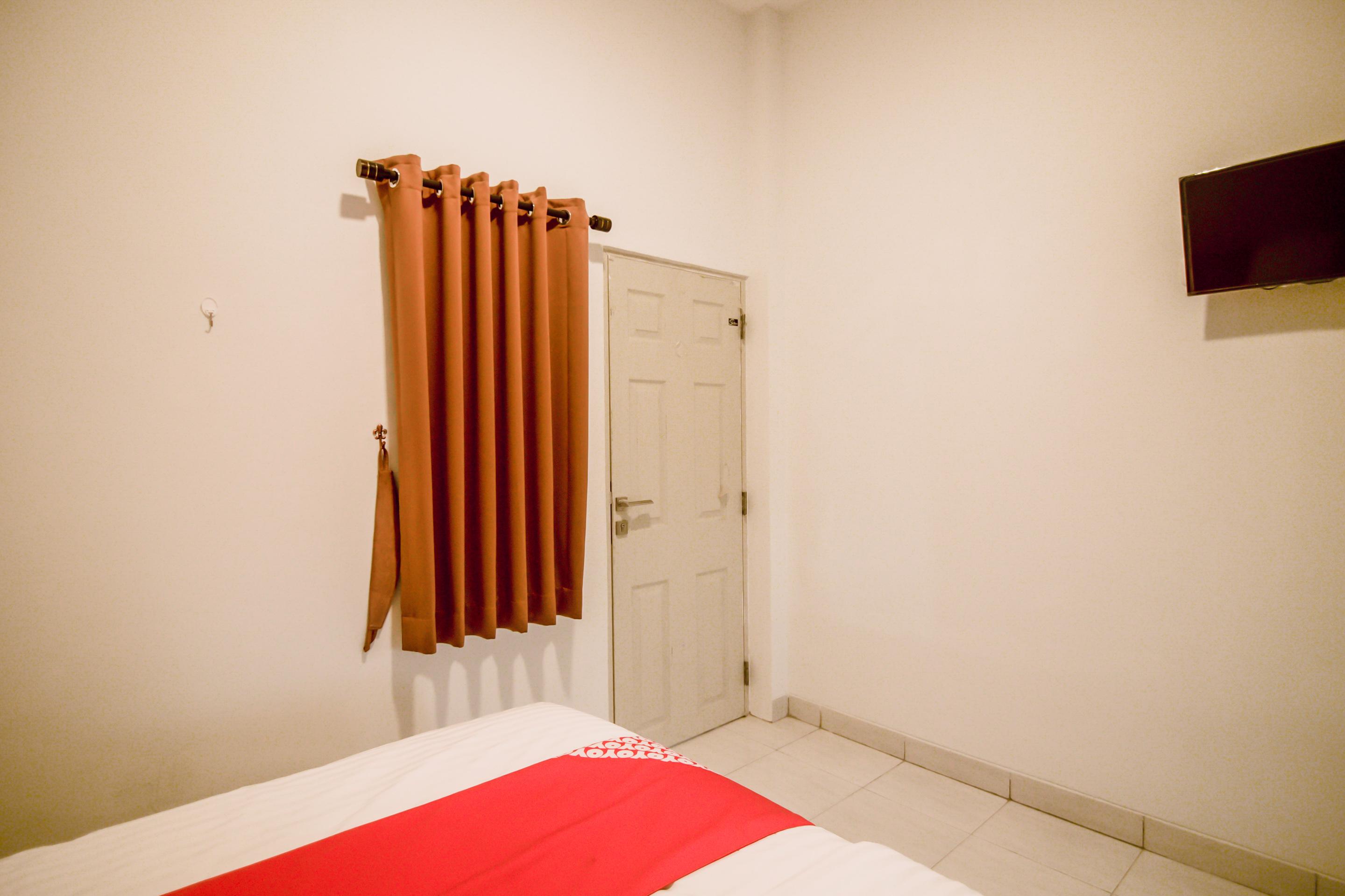 Oyo 183 The Pipe House Hotel Palembang Bagian luar foto
