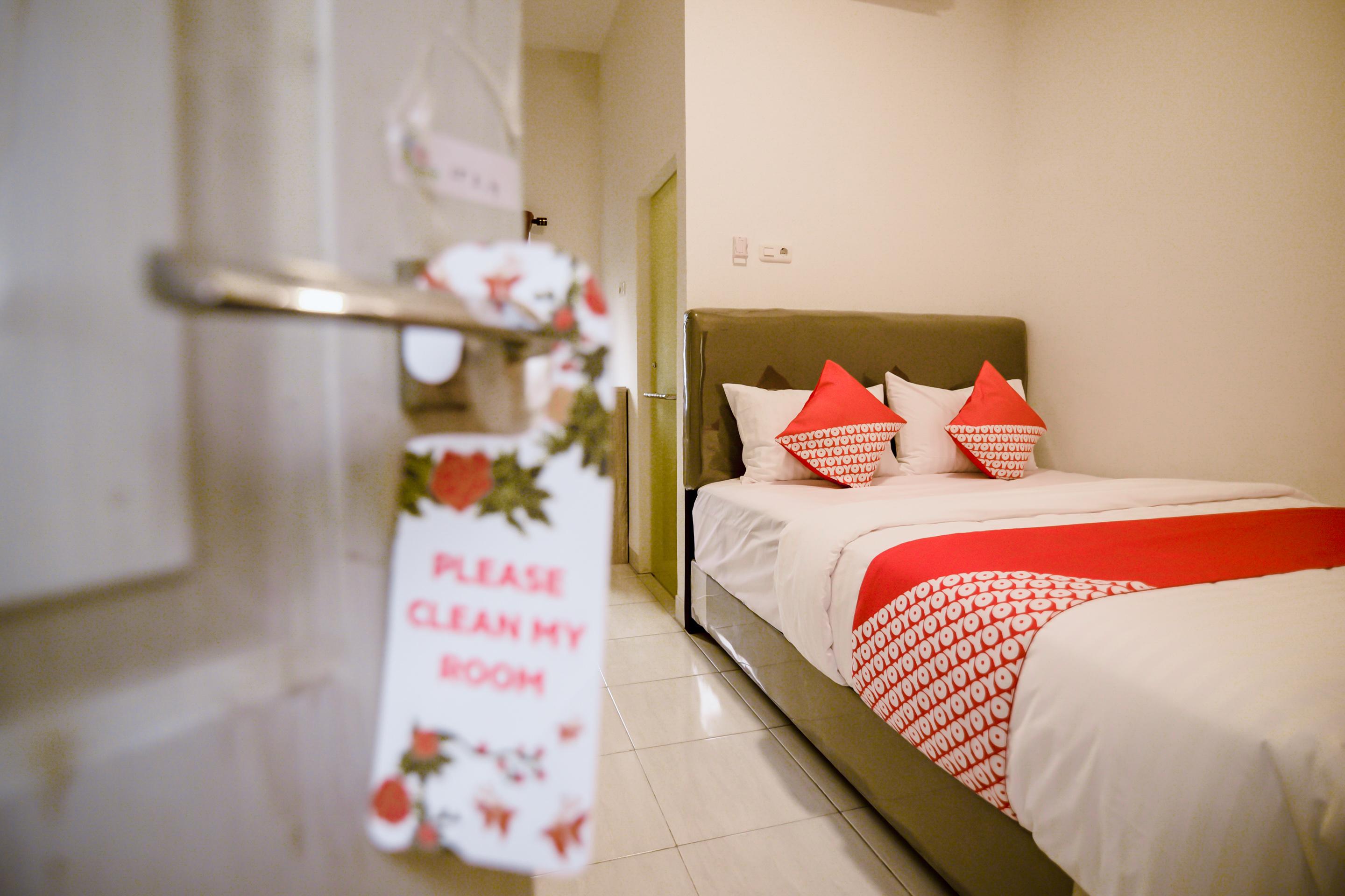 Oyo 183 The Pipe House Hotel Palembang Bagian luar foto