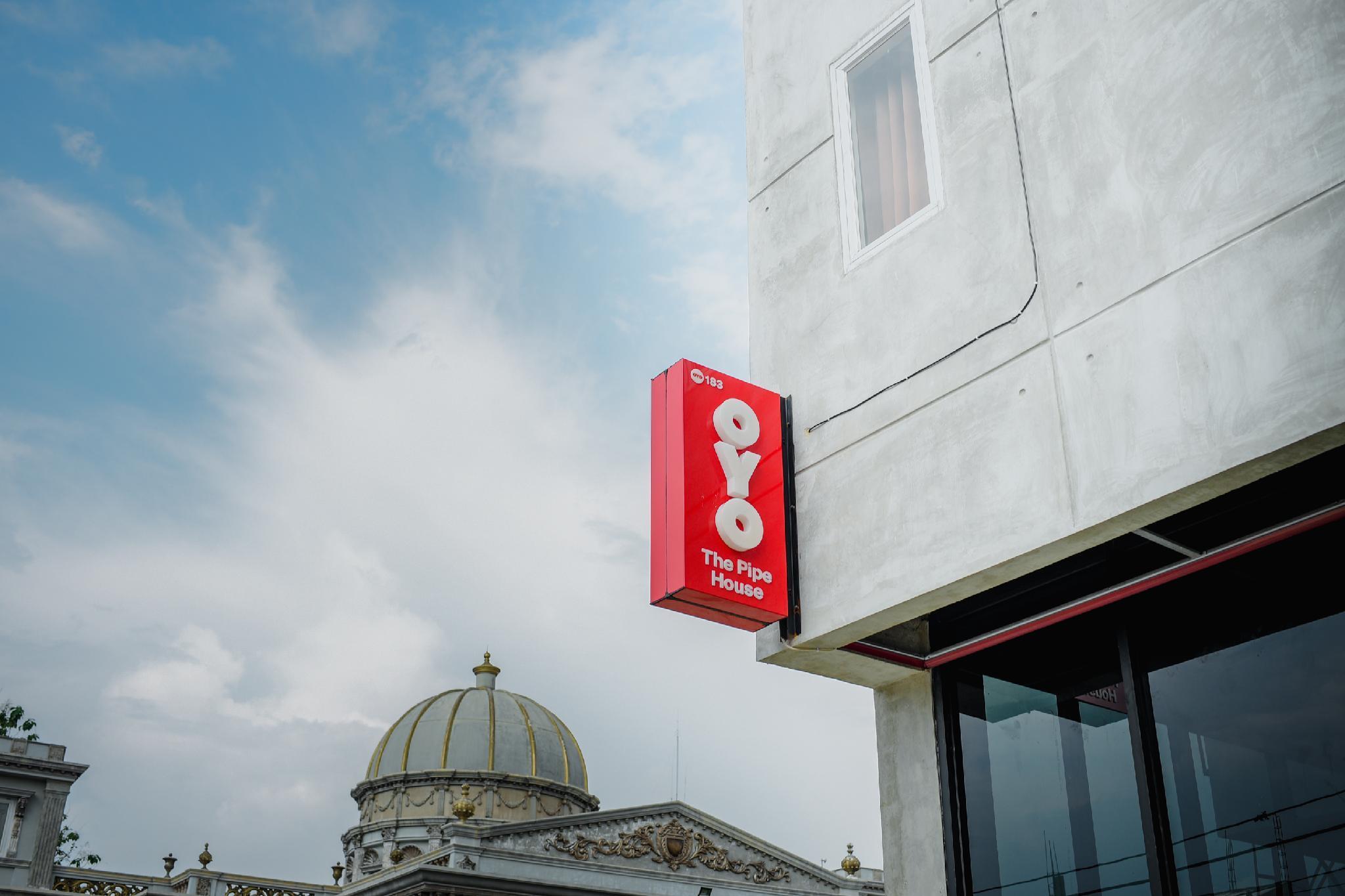 Oyo 183 The Pipe House Hotel Palembang Bagian luar foto