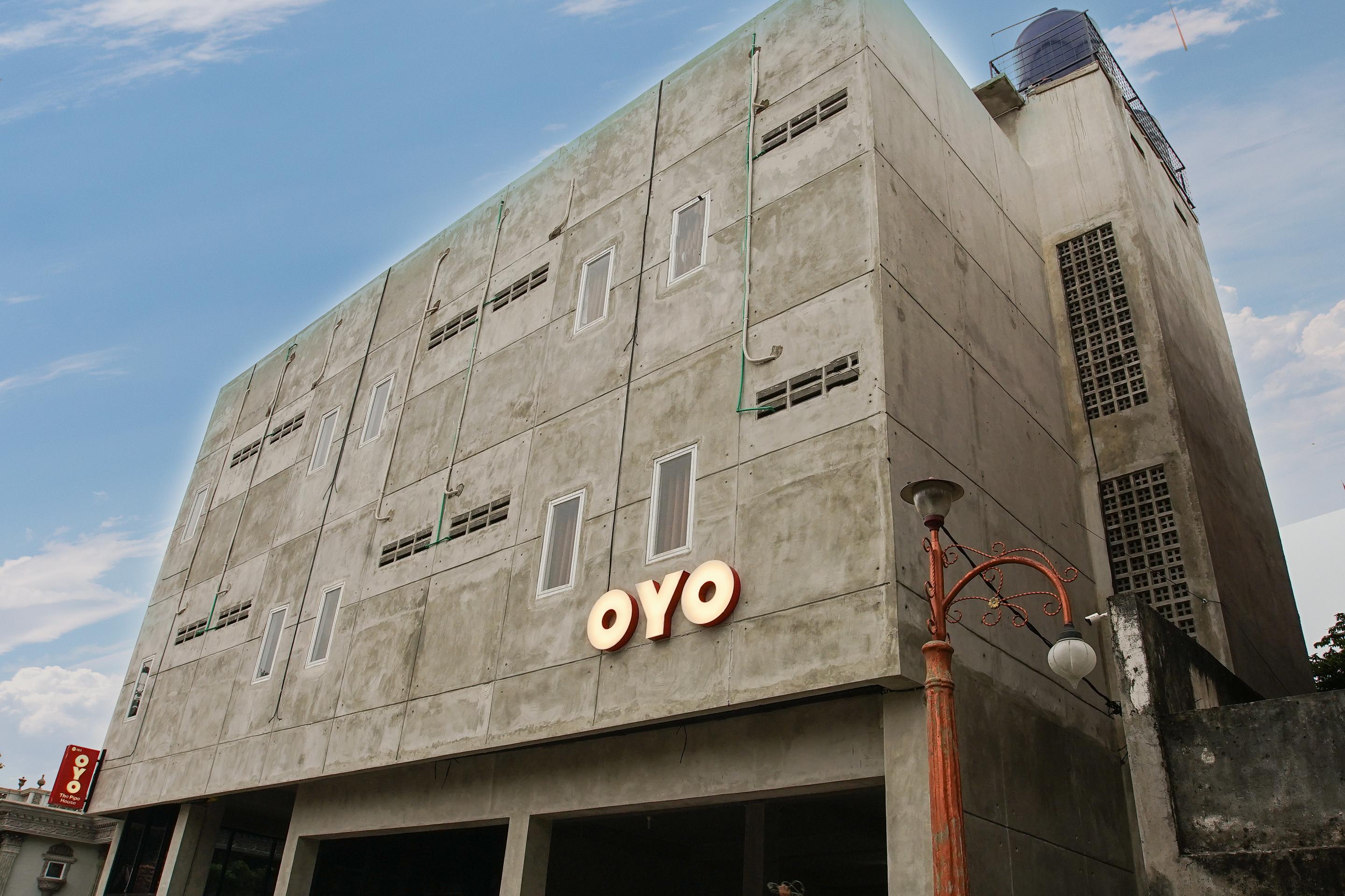 Oyo 183 The Pipe House Hotel Palembang Bagian luar foto