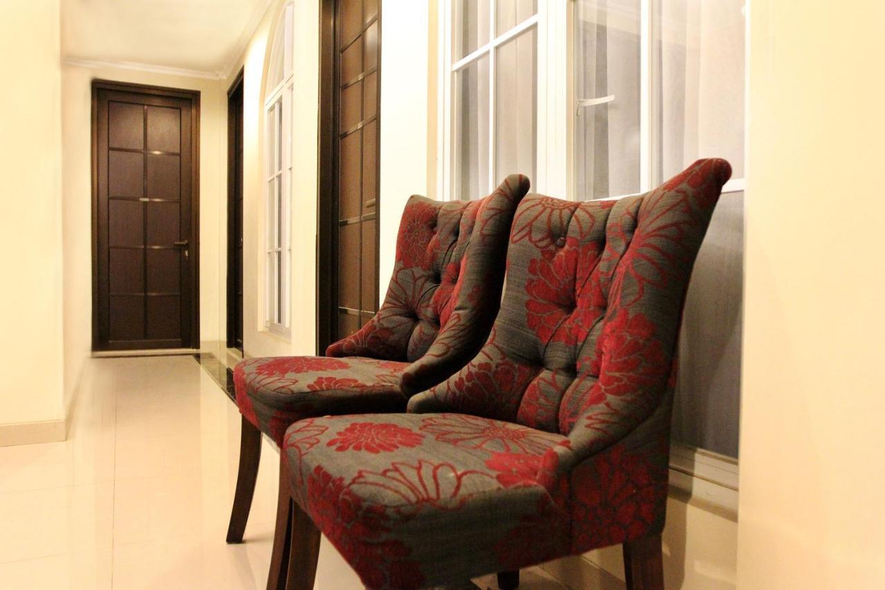 Oyo 183 The Pipe House Hotel Palembang Bagian luar foto